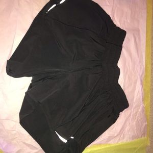 black lululemon 4” shorts